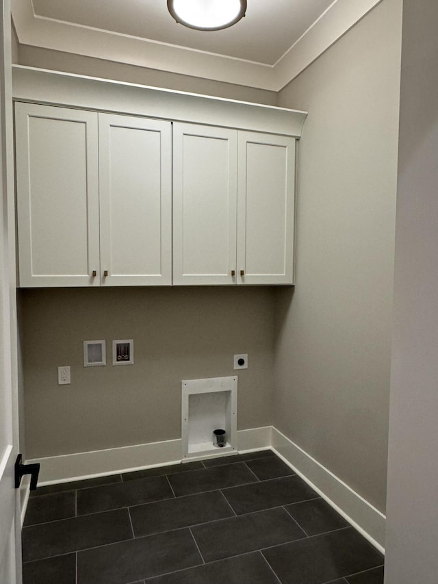 9418 Haviland Way, Ooltewah, TN 37363 - laundry area with hookup for an electric dryer, cabinet space, washer hookup, and dark tile patterned floors