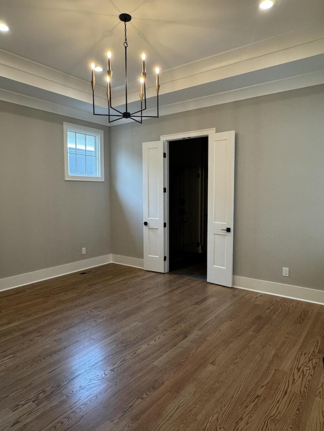 9418 Haviland Way, Ooltewah, TN 37363 - unfurnished room featuring a chandelier, dark wood finished floors, and recessed lighting