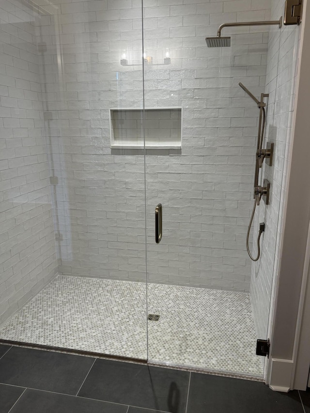 9418 Haviland Way, Ooltewah, TN 37363 - full bath featuring a stall shower and tile patterned flooring
