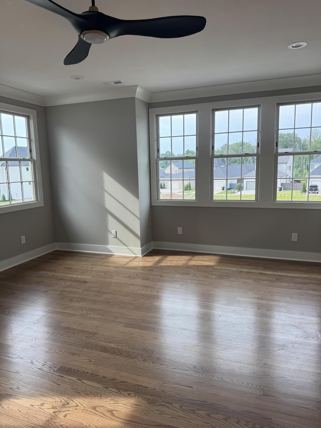 9418 Haviland Way, Ooltewah, TN 37363 - spare room featuring wood finished floors, a ceiling fan, and ornamental molding