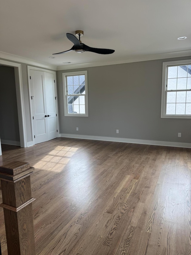 9418 Haviland Way, Ooltewah, TN 37363 - unfurnished bedroom featuring wood finished floors, ornamental molding, and a ceiling fan