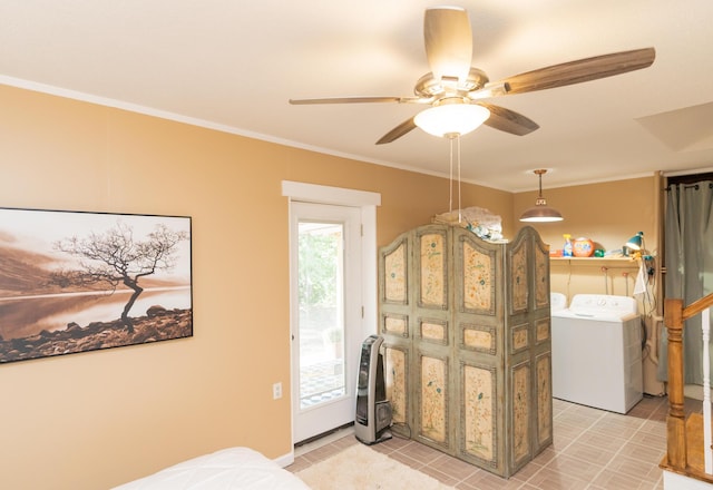 interior space with washing machine and dryer, ceiling fan, light tile patterned flooring, and ornamental molding