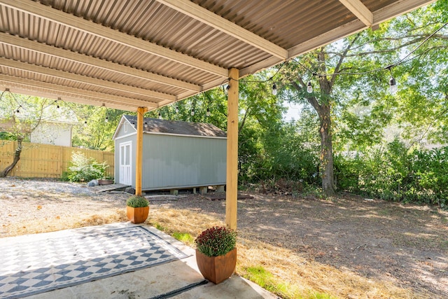 view of patio / terrace with a storage unit