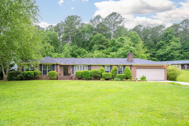 single story home with a front lawn and a garage