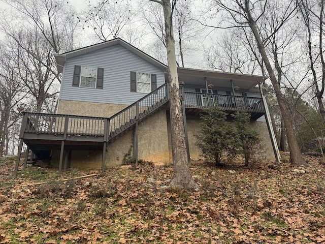 rear view of house with a deck