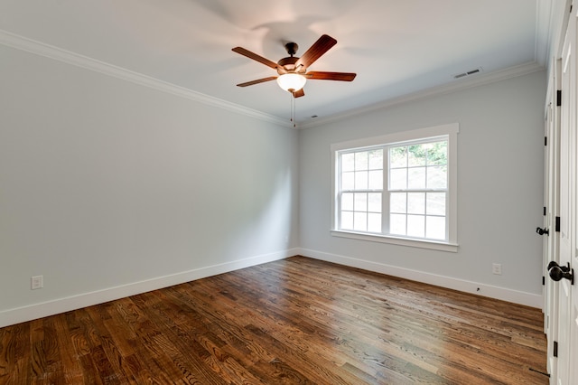 spare room with hardwood / wood-style flooring, ceiling fan, and ornamental molding