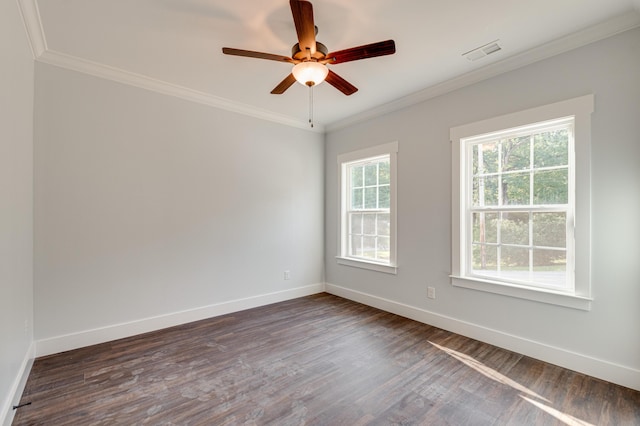 unfurnished room with ceiling fan, dark hardwood / wood-style floors, and crown molding