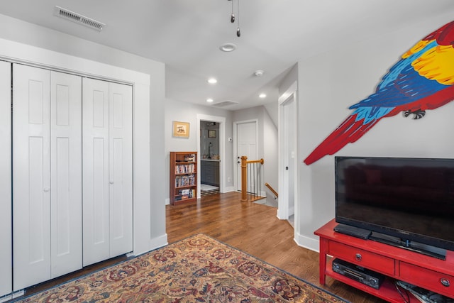 entryway with dark hardwood / wood-style floors