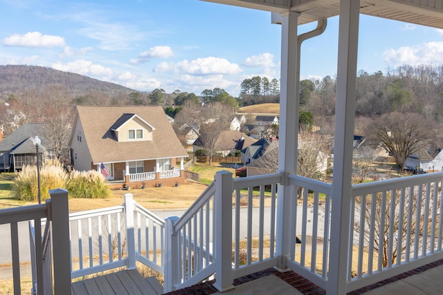 wooden terrace featuring a mountain view