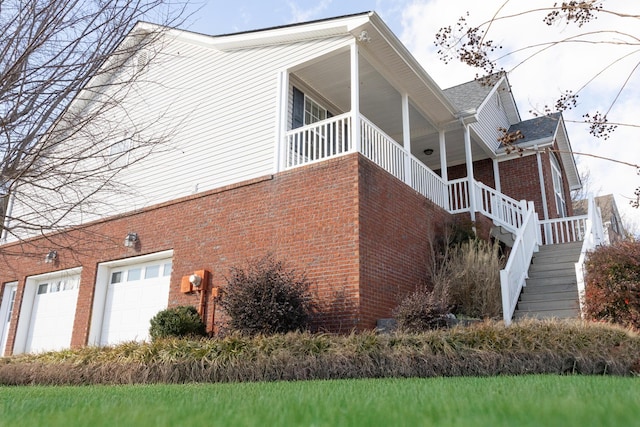 view of side of property featuring a garage