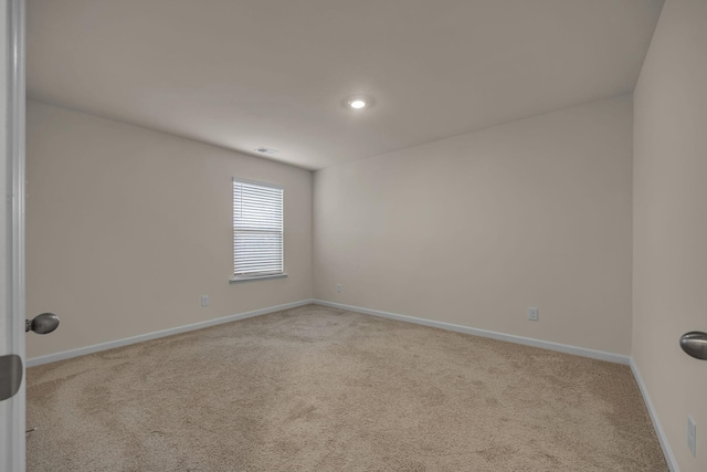 view of carpeted spare room