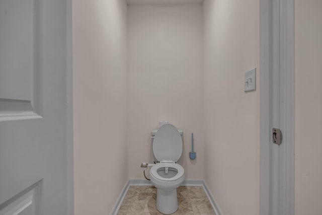 bathroom featuring toilet