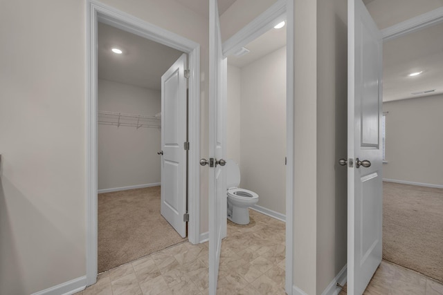 bathroom featuring toilet