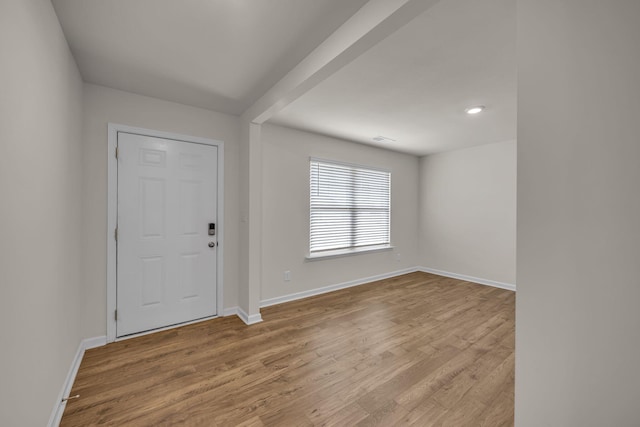 entrance foyer featuring light hardwood / wood-style floors