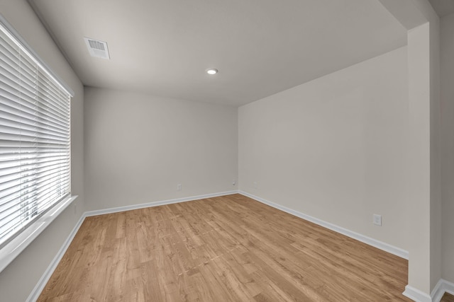 empty room with light wood-type flooring