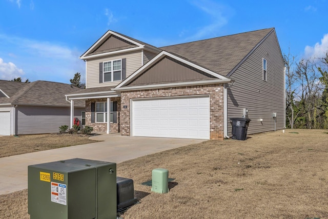 craftsman-style home with a garage and a front yard