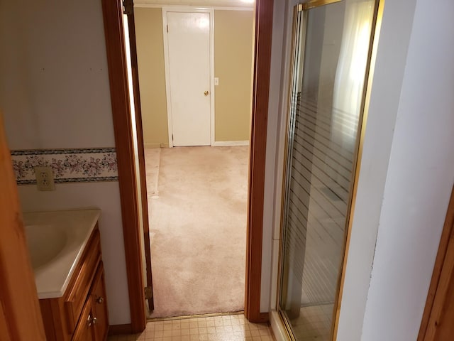 bathroom with vanity and an enclosed shower