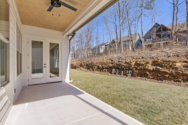 exterior space with ceiling fan, a patio, and french doors