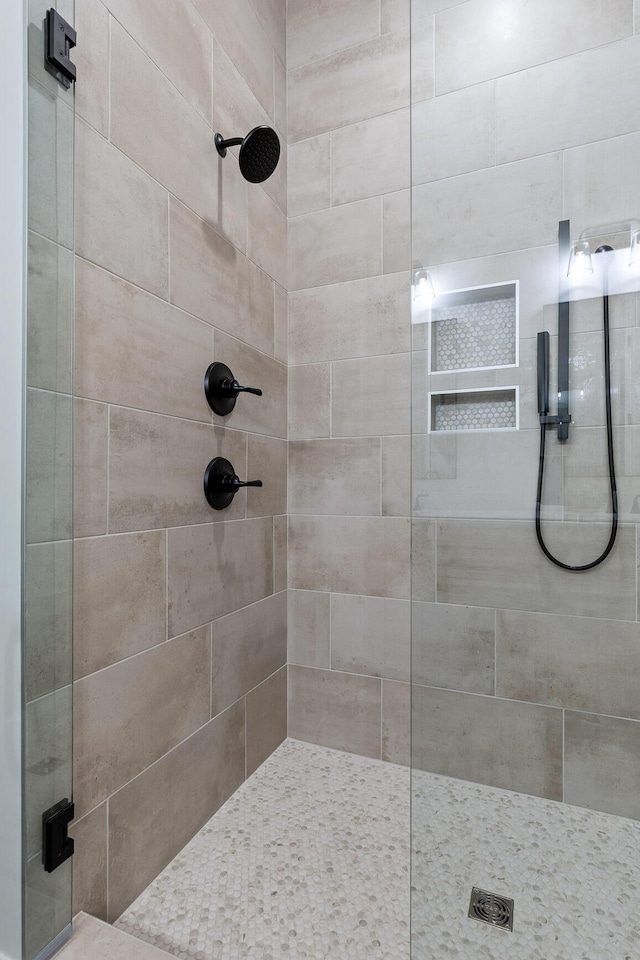 full bathroom featuring a stall shower