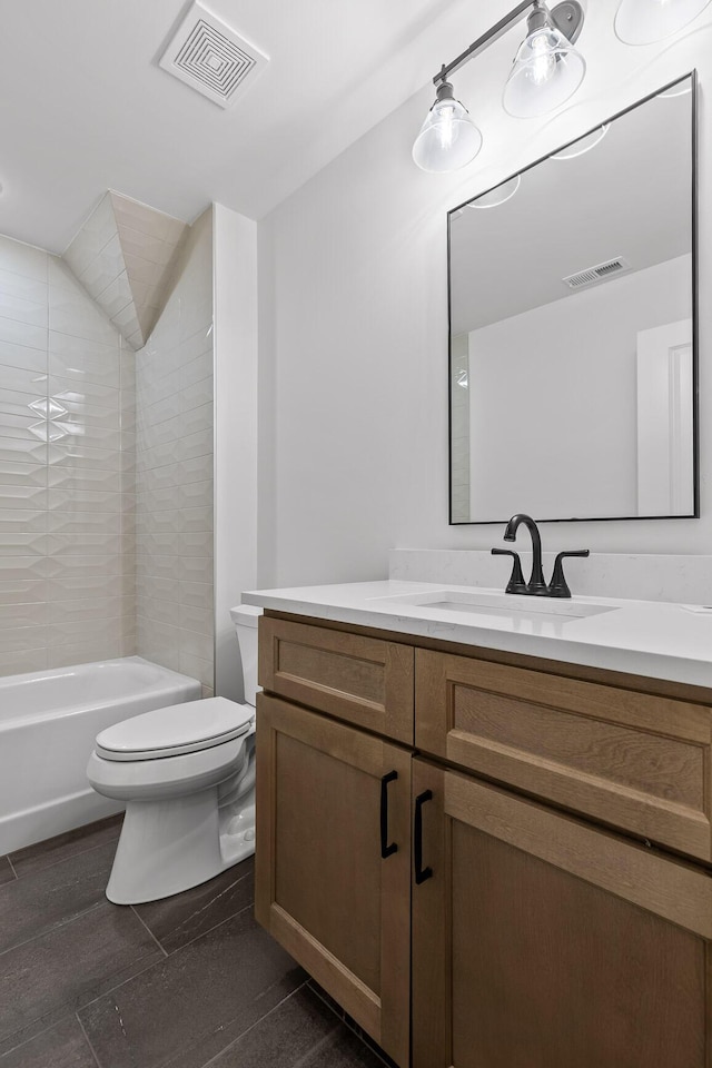 full bathroom featuring toilet, washtub / shower combination, vanity, and visible vents