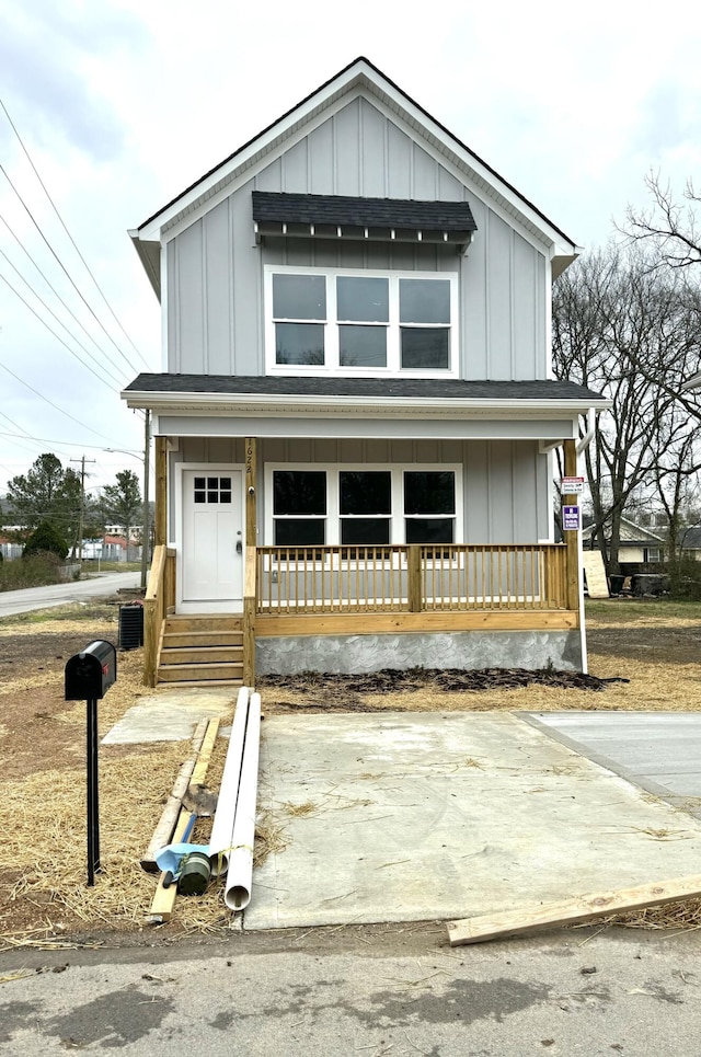 view of front of property with covered porch and board and batten siding