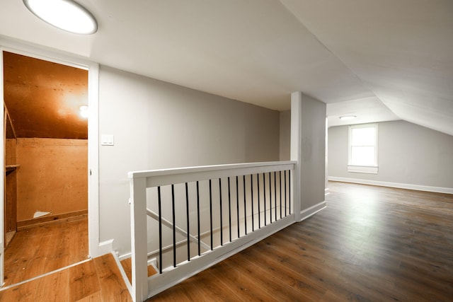 bonus room featuring hardwood / wood-style floors and lofted ceiling