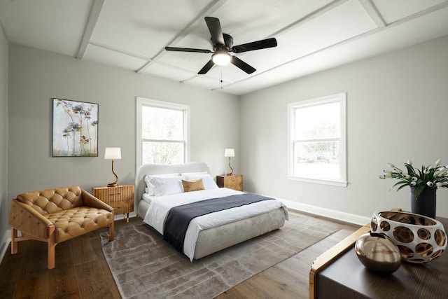 bedroom with wood-type flooring and ceiling fan