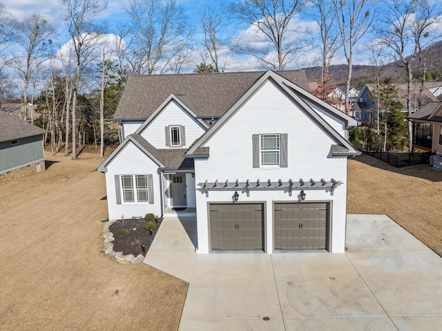 view of front of home with a garage