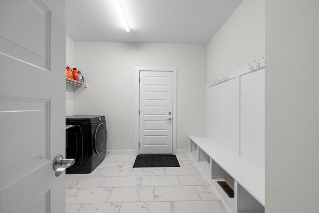 clothes washing area with washer and dryer