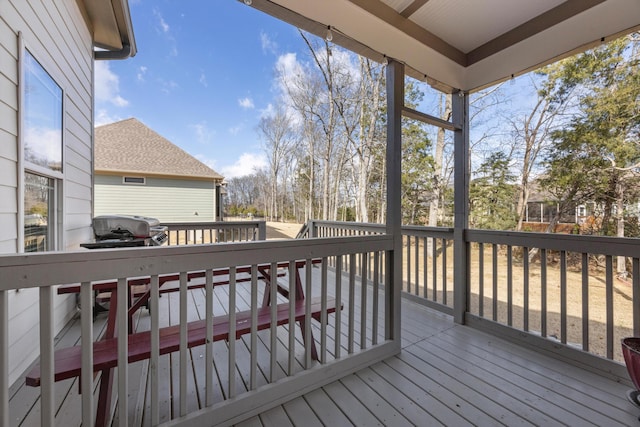 wooden deck with area for grilling