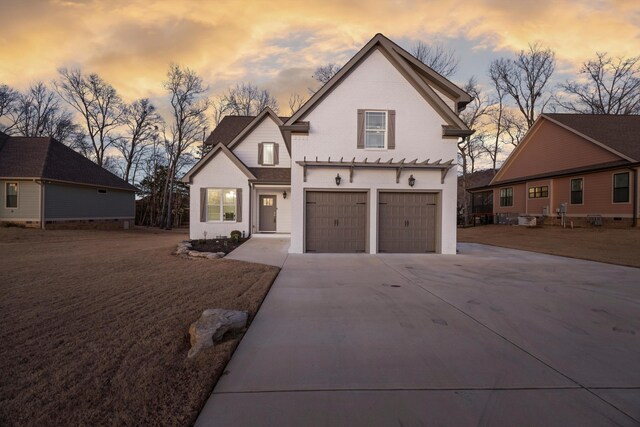 view of front of home with a garage