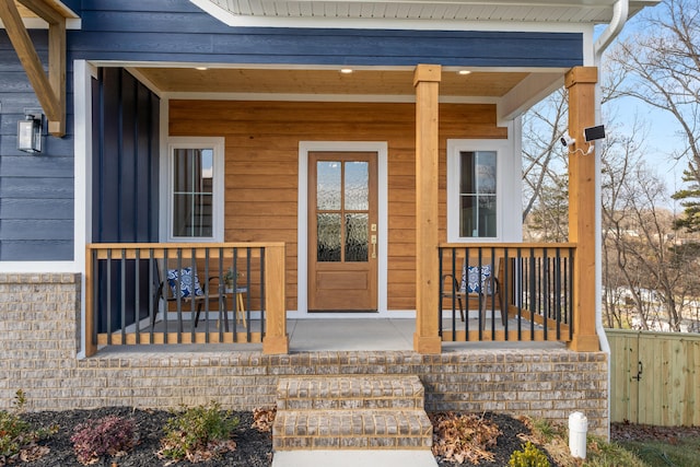 doorway to property featuring a porch