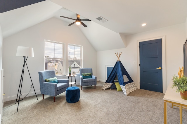 recreation room with carpet flooring, ceiling fan, and lofted ceiling