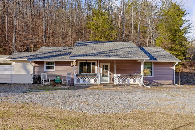 ranch-style house with covered porch