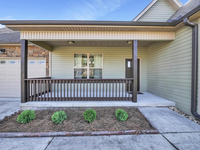 doorway to property featuring covered porch