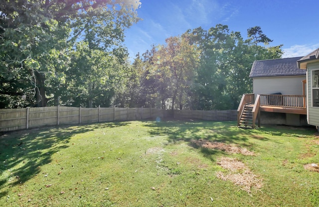 view of yard featuring a deck