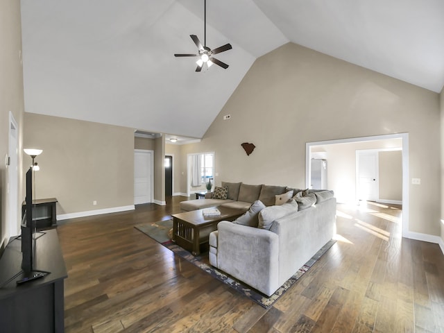 living room featuring ceiling fan, high vaulted ceiling, and dark wood-type flooring