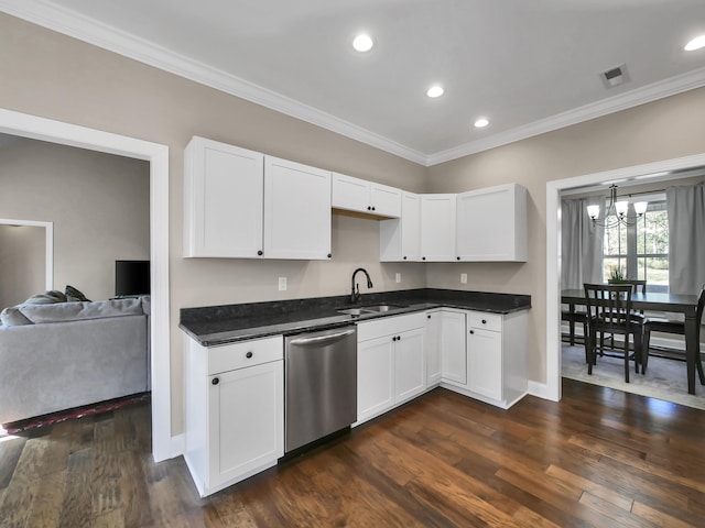 kitchen with white cabinets, stainless steel dishwasher, a notable chandelier, and sink