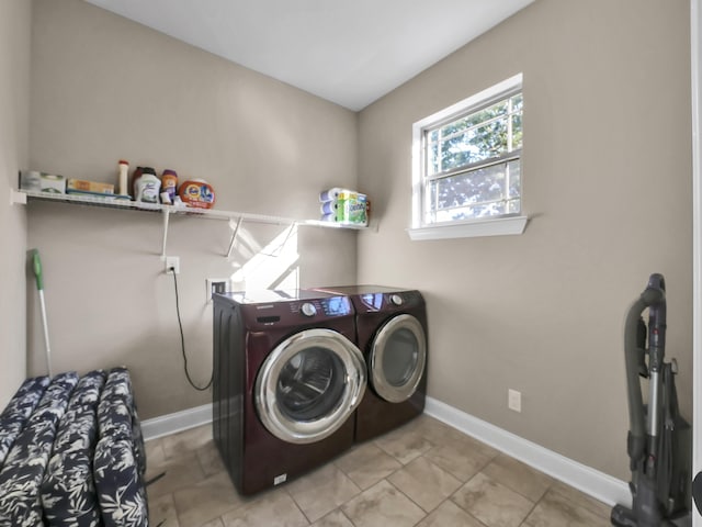 washroom with washer and dryer