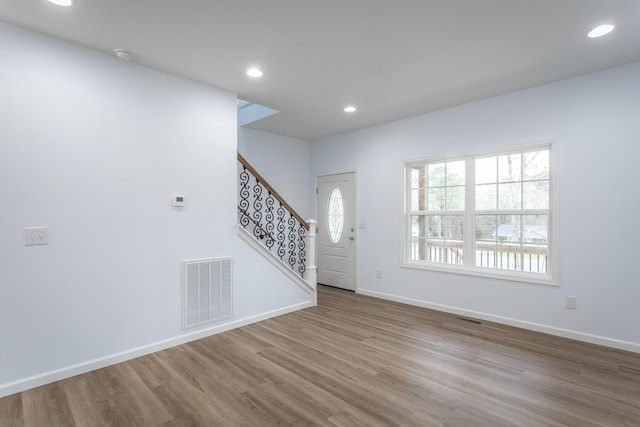 foyer featuring wood-type flooring