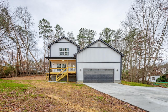 view of front of property featuring a garage and covered porch