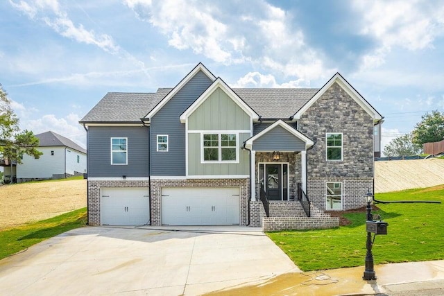 raised ranch with a garage and a front yard