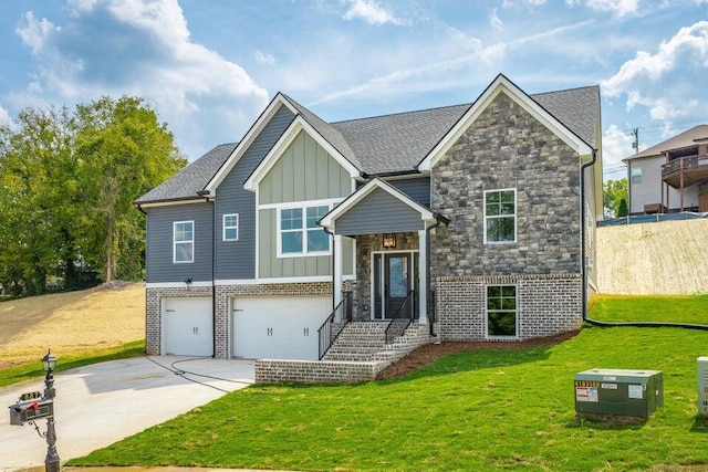 view of front facade with a garage and a front lawn