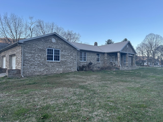 view of property exterior featuring a yard