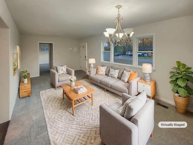 living room with a notable chandelier