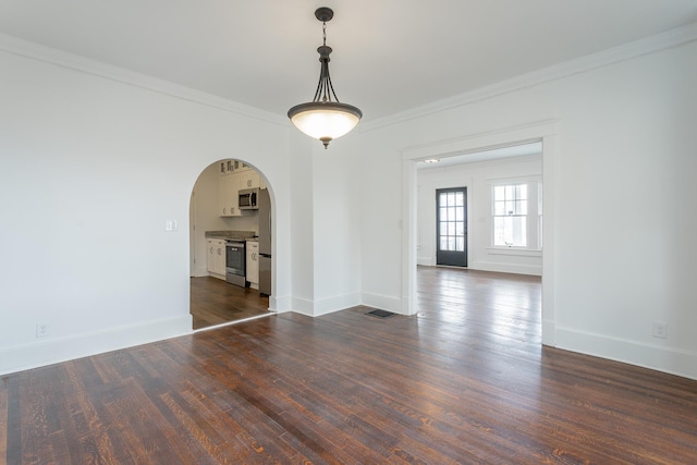 unfurnished room with dark hardwood / wood-style floors and ornamental molding