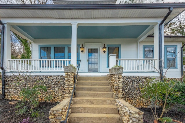 entrance to property with a porch