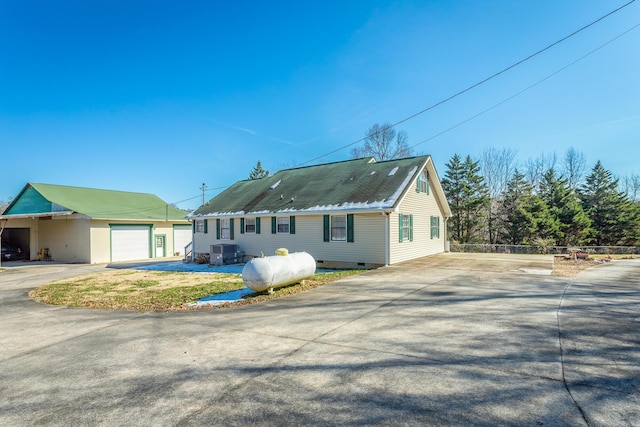 view of front of house featuring central AC unit