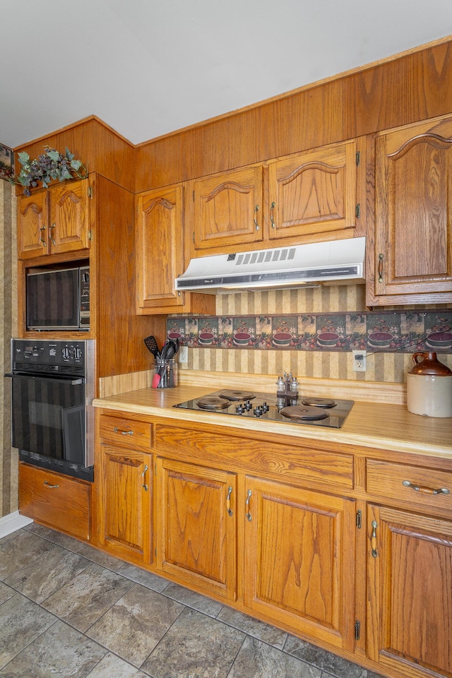 kitchen featuring black appliances