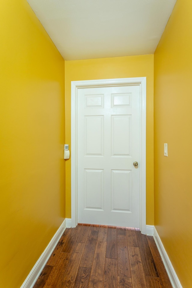 doorway featuring dark hardwood / wood-style flooring